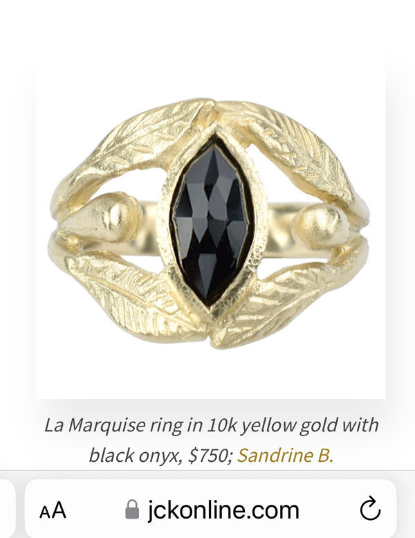 la marquise ring in 10K with a black onyx