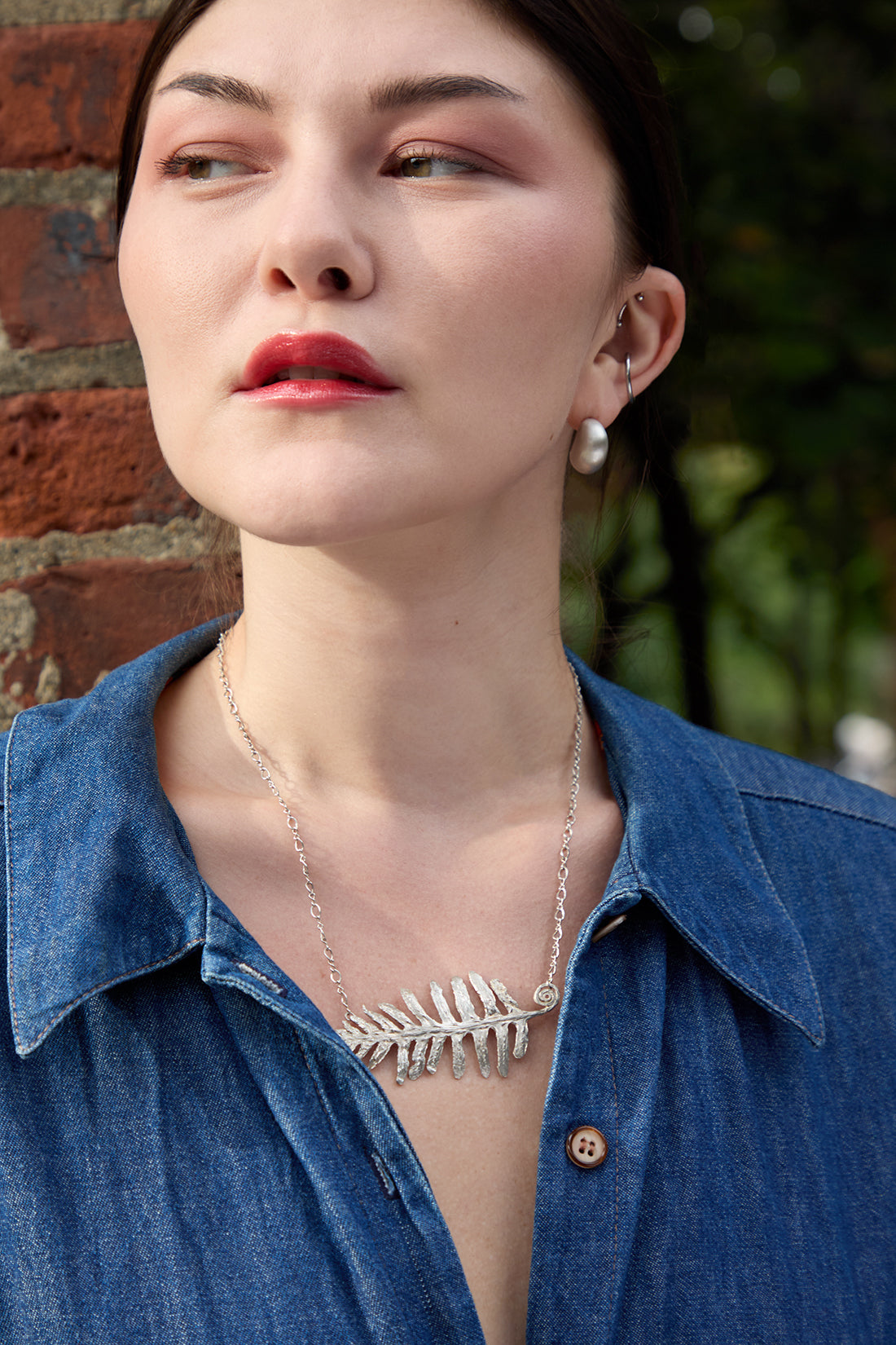 the silver lunar crescent earrings