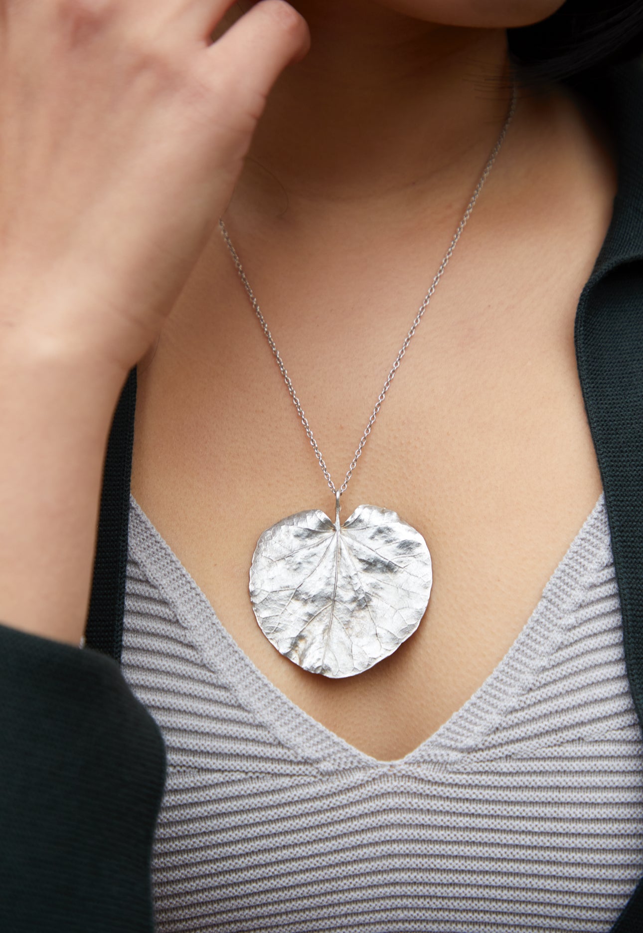 the Corsican leaf lily pad shape heart pendant