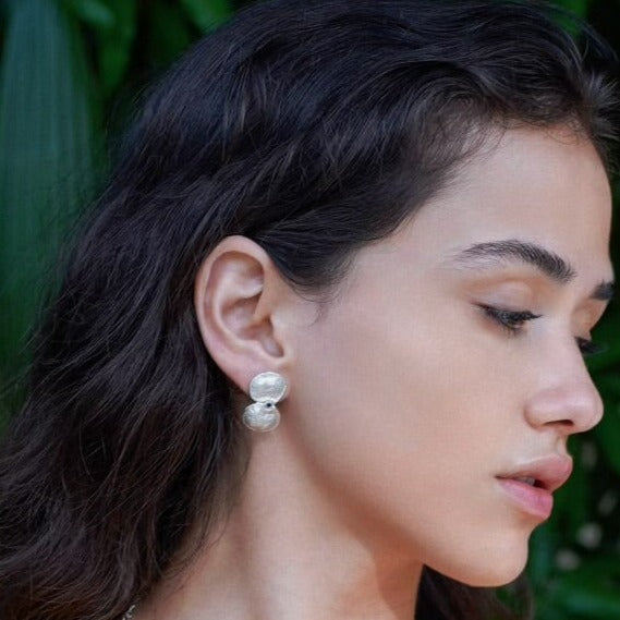 silver elongated seed pod earrings