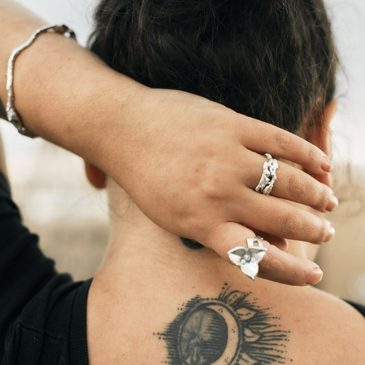 the silver seed pod ring