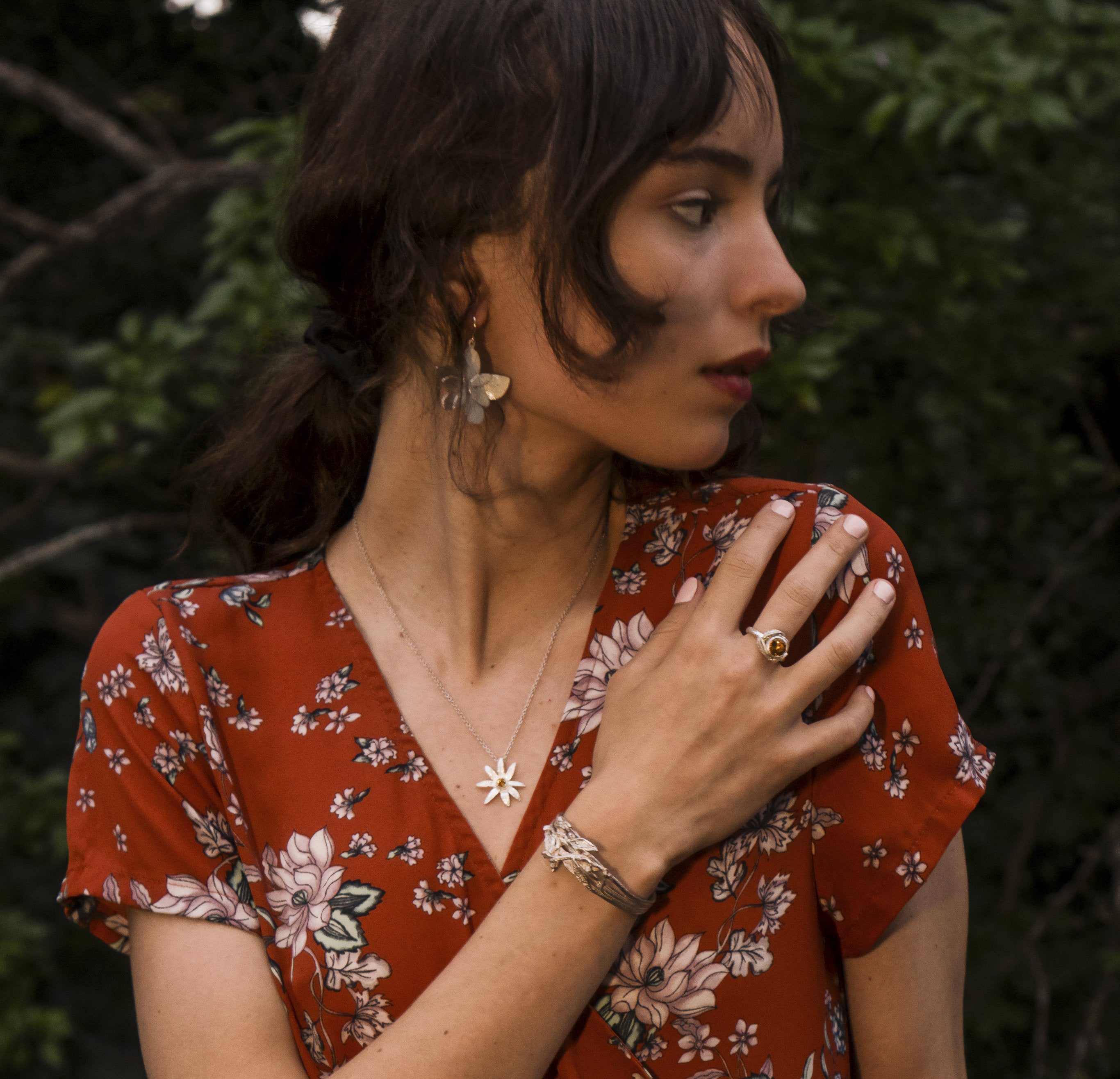 the flower pendant in silver with a golden citrine