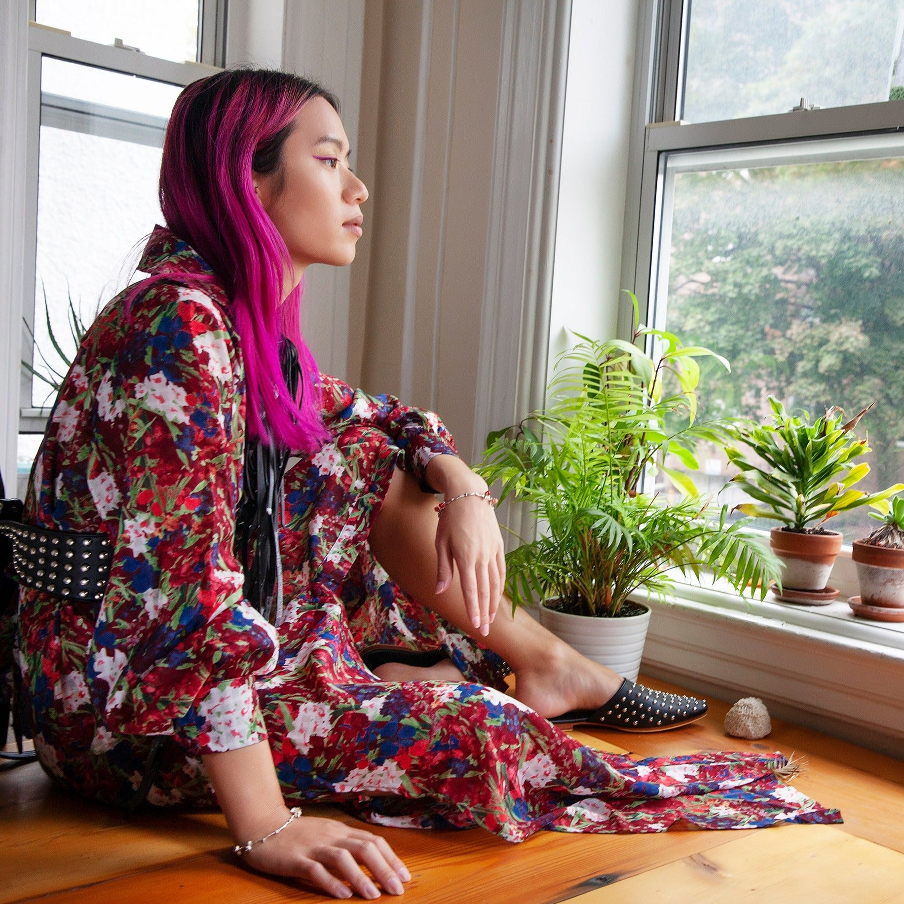 the silver coral beads bangle on a dates' branch
