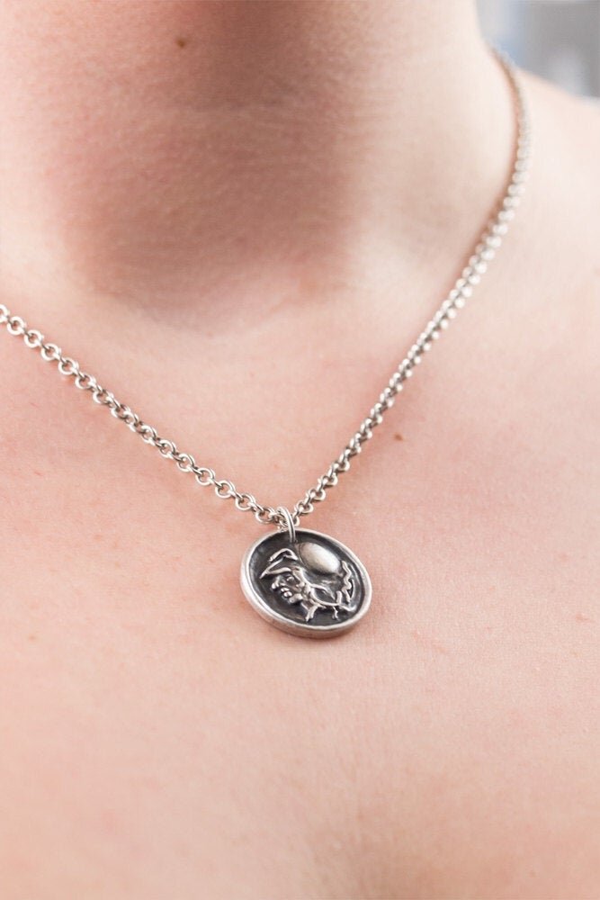 Le pendentif guerrier en argent