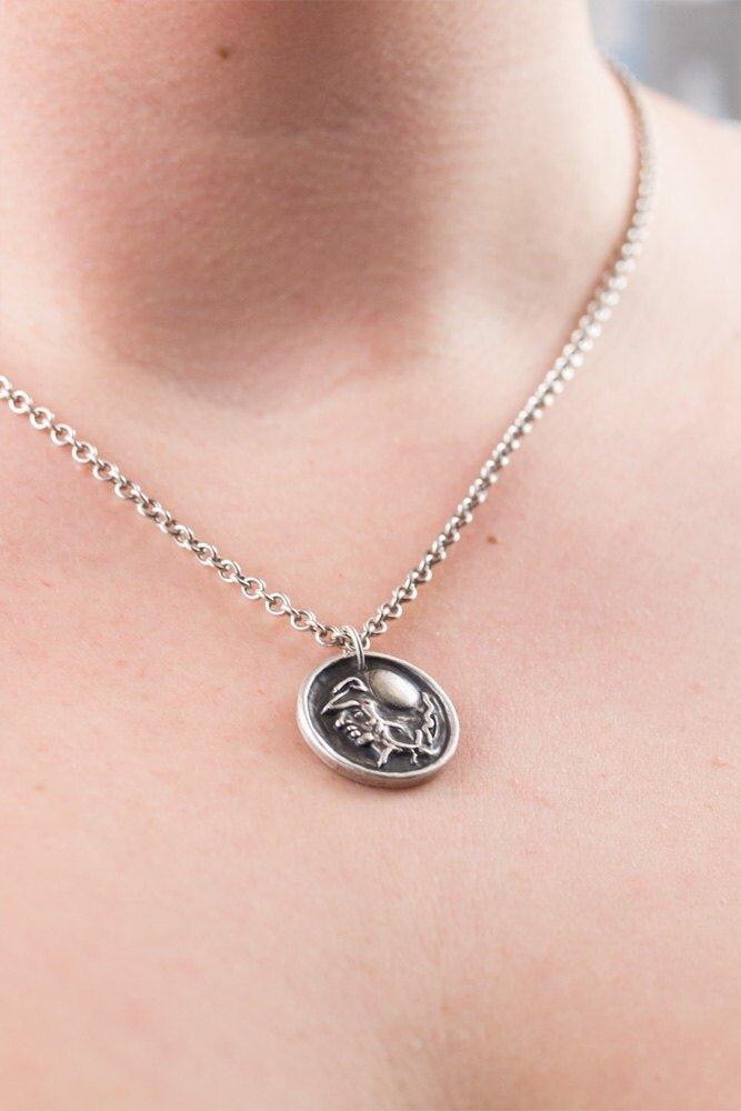 Le pendentif guerrier en argent