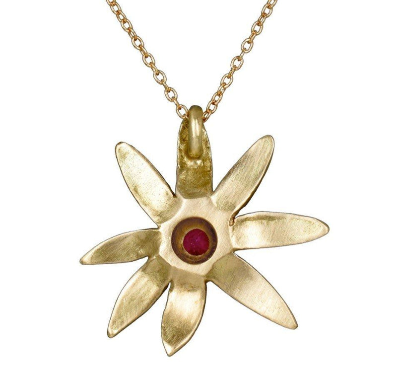 the flower pendant in 18K gold with a rubellite gemstone