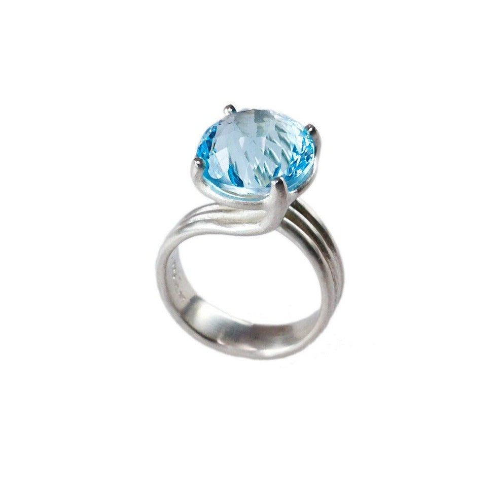 bague griffes glycine topaze bleue