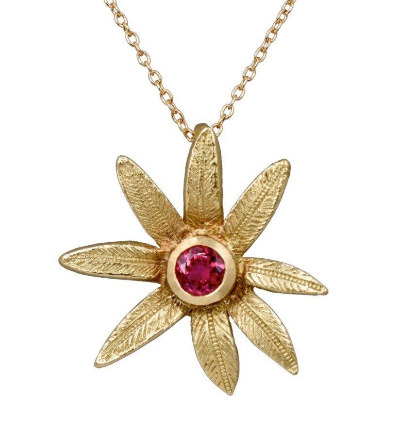 the flower pendant in 18K gold with a rubellite gemstone ready to ship