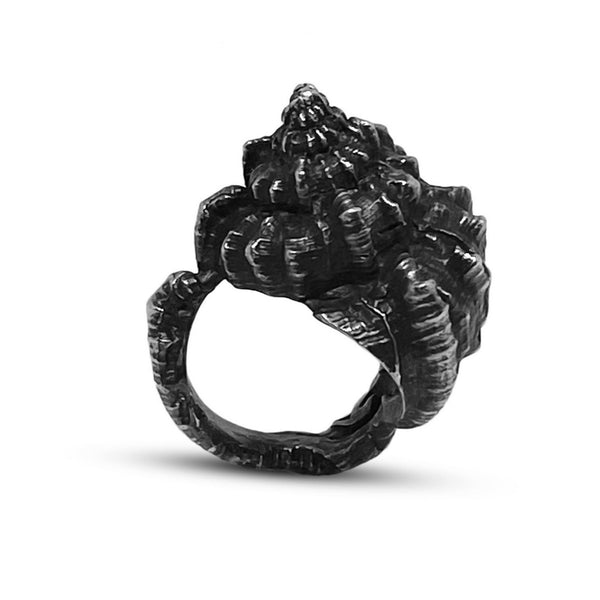 The oxidized sea shell ring molded from a sea shell