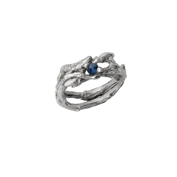 The twig branch in silver with a blue sapphire size 9.5