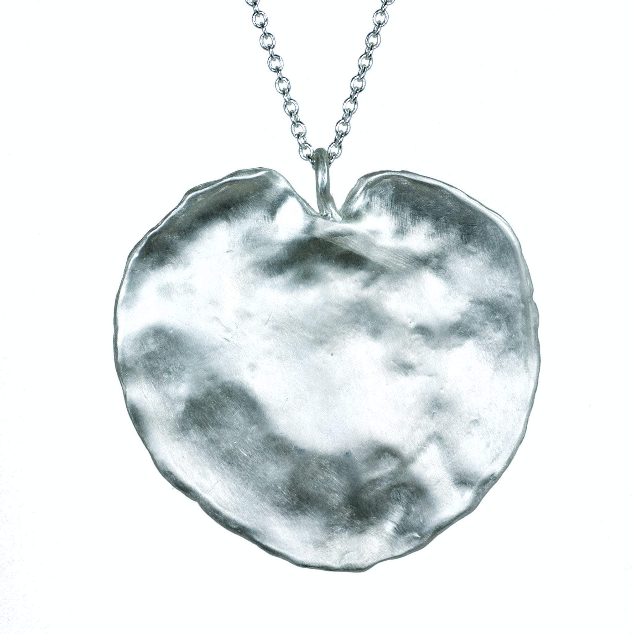 the Corsican leaf lily pad shape heart pendant