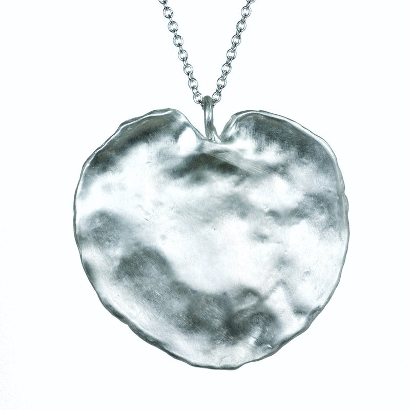 The Corsican leaf lily pad shape heart pendant