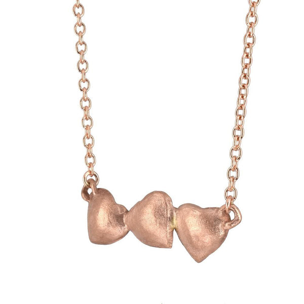 10 K pink and yellow gold dancing hearts on a chain