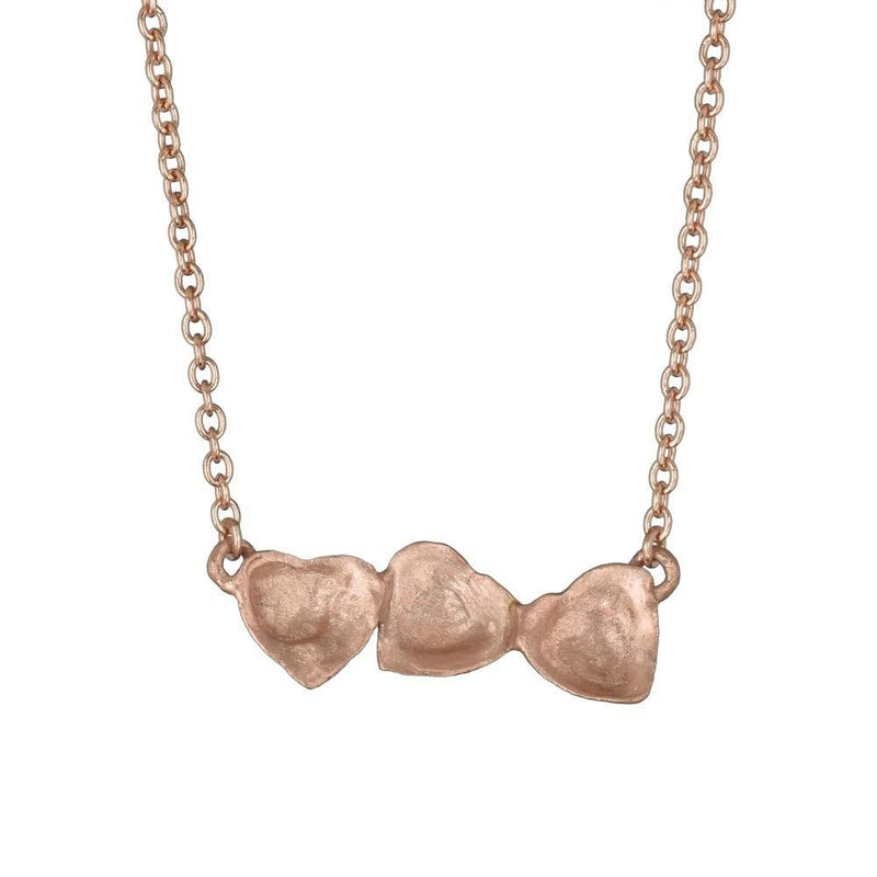10 K pink and yellow gold dancing hearts on a chain