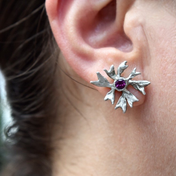 the maple flower earrings with rhodolite garnets